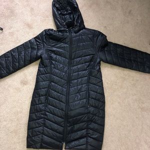 A black Tek Gear puffer winter coat